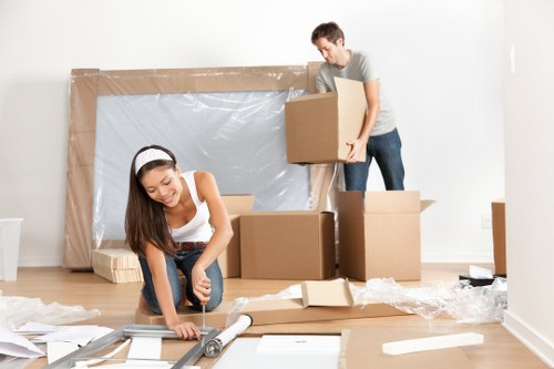 Packed moving boxes ready for a home move in Brixton flat