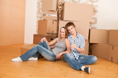 Removal van and moving team preparing a Brixton house move