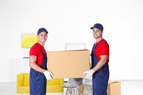 Movers team preparing items for a UK removal service