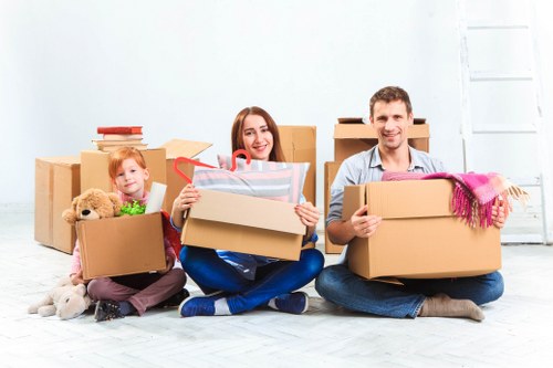 Removal team preparing a Brixton home move with boxes and furniture