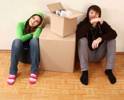 Local moving team handling furniture in a Brixton property