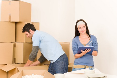 Customer and movers confirming details before transport